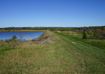 Crest of an earth dam and its reservoir